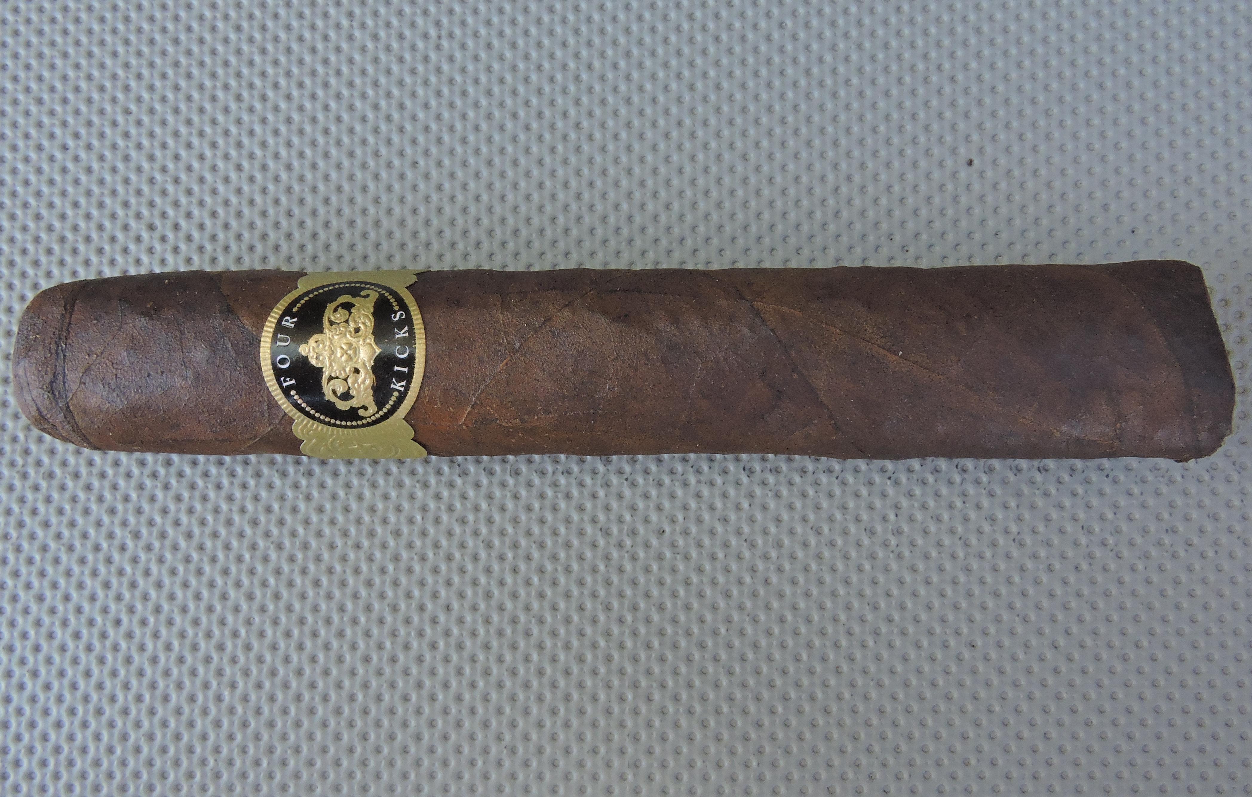 Four Kicks Maduro Robusto Extra by Crowned Heads